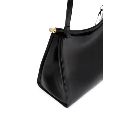 Alaïa Le Click Medium Curve Shoulder Bag In Glossy Leather In Black