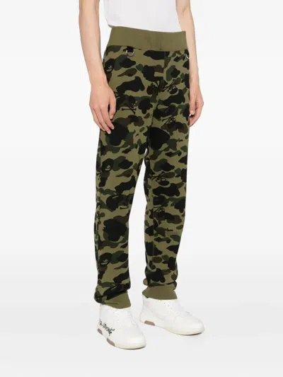 Mastermind Japan X A Bathing Ape Trousers In Green
