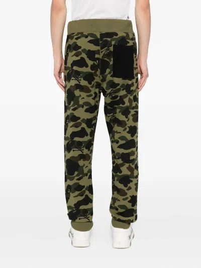 Mastermind Japan X A Bathing Ape Trousers In Green