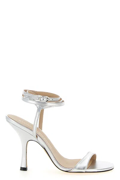 Stuart Weitzman Metallic Buckle Wrap Sandals In Silver
