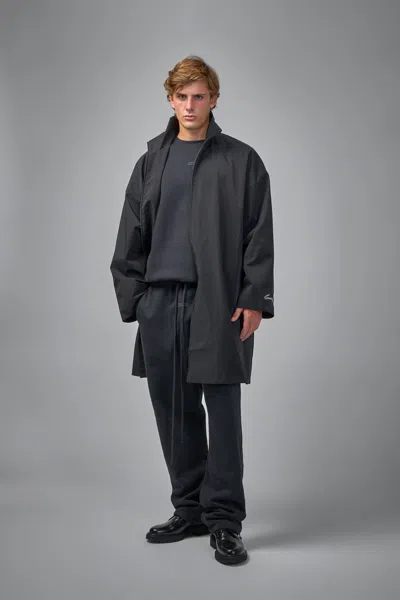 Essentials Long Nylon Jacket With Logo Patch. In Black