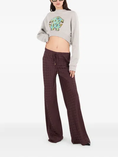 Roberto Cavalli Monogram-pattern Drawstring Trousers In Red