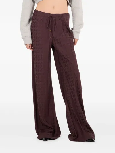 Roberto Cavalli Monogram-pattern Drawstring Trousers In Red