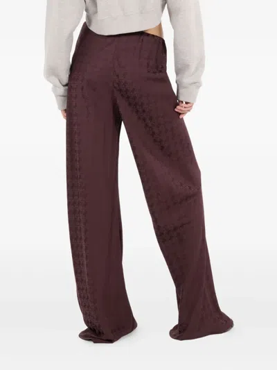Roberto Cavalli Monogram-pattern Drawstring Trousers In Red