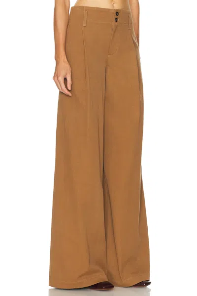 Chloé Pleated Garment-dyed Cotton-canvas Straight-leg Pants In Brown