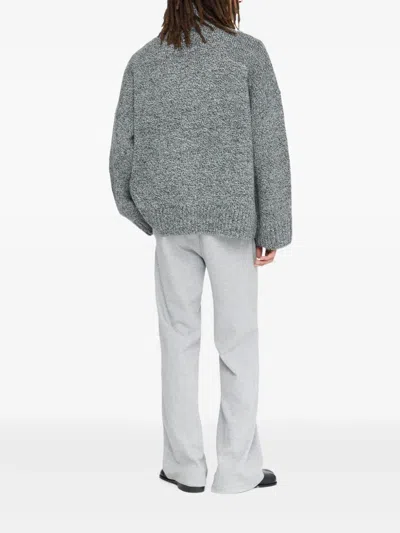 Jw Anderson Grey Sweater With High Neck And One Front Patch Leather Pocket In Wool Blend Man In Gray