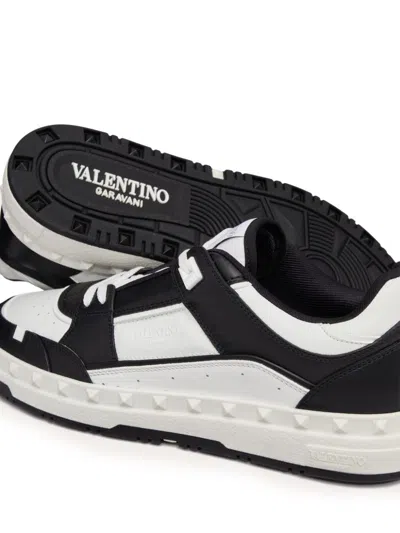 Valentino Garavani 'freedots' White And Black Low Top Sneakers With Studs In Leather Man