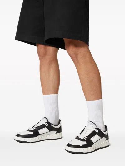 Valentino Garavani 'freedots' White And Black Low Top Sneakers With Studs In Leather Man