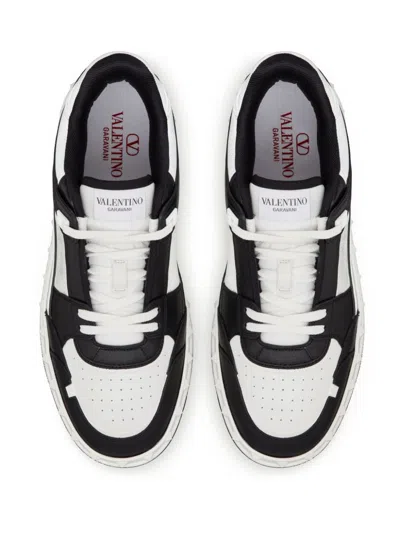Valentino Garavani 'freedots' White And Black Low Top Sneakers With Studs In Leather Man