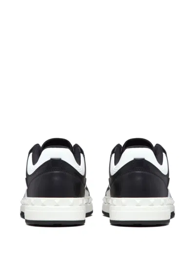 Valentino Garavani 'freedots' White And Black Low Top Sneakers With Studs In Leather Man
