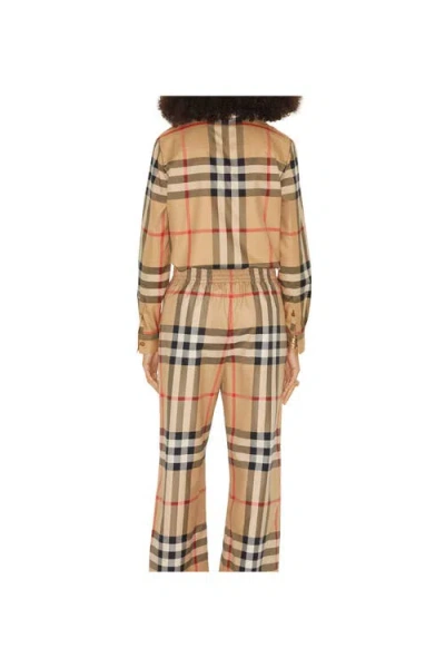 Burberry Check-pattern Flared Cotton Trousers In Brown