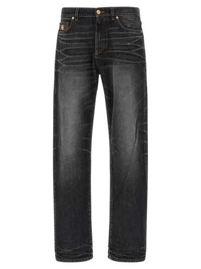 Versace Denim Jeans With Faded Effect And Contrast Stitching In Gray