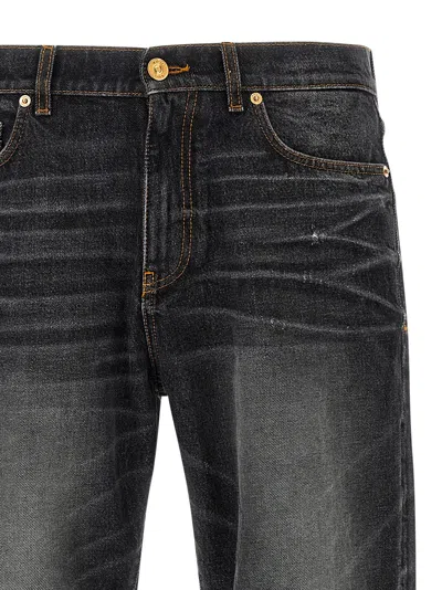 Versace Denim Jeans With Faded Effect And Contrast Stitching In Gray