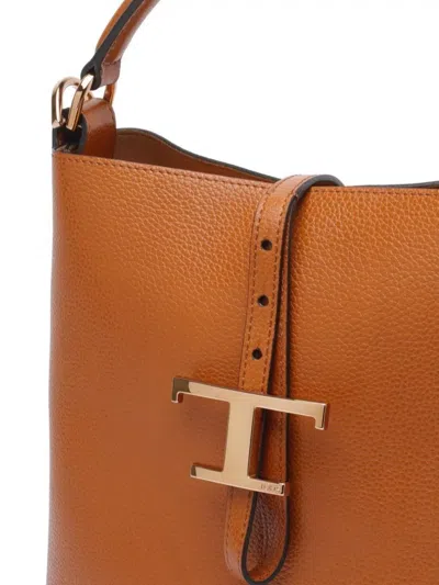 Tod's Brown Textured Leather Bucket Bag With Adjustable Strap And Gold-tone Logo