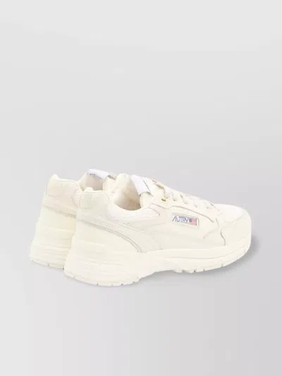 Autry Hyperway Sneakers In Whisper White Laminated Leather And Mesh In Neutral