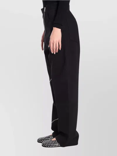 Alaïa Ribbed Knit High Neck Bodysuit With Zipper In Black