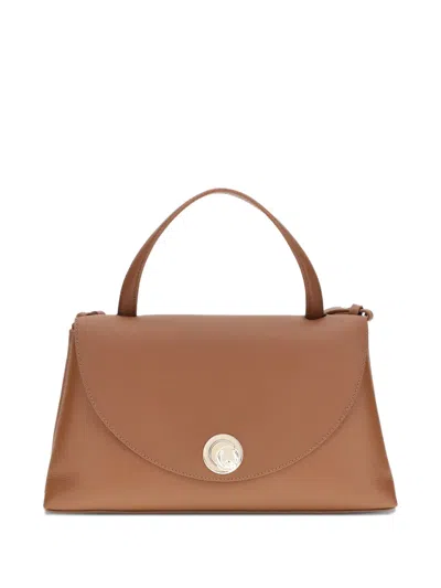 Coccinelle Curved Top Handbag With Circular Detail And Detachable Shoulder Strap In Brown