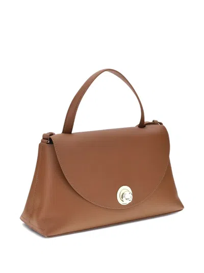 Coccinelle Curved Top Handbag With Circular Detail And Detachable Shoulder Strap In Brown