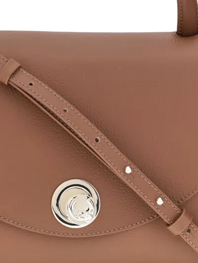 Coccinelle Curved Top Handbag With Circular Detail And Detachable Shoulder Strap In Brown