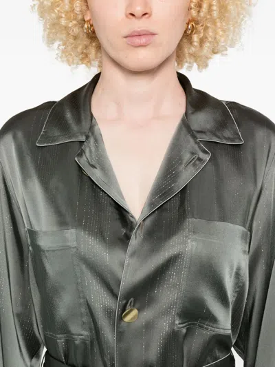 金属感细节束腰夹克