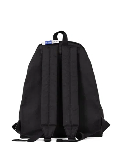 In・stru(men-tal) Label-detail Backpack In Black