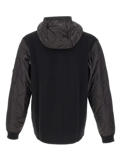 C.p. Company Men Black Jacket With Drawstring Hood And Logo Plaque On The Sleeve In Wool Man In Black