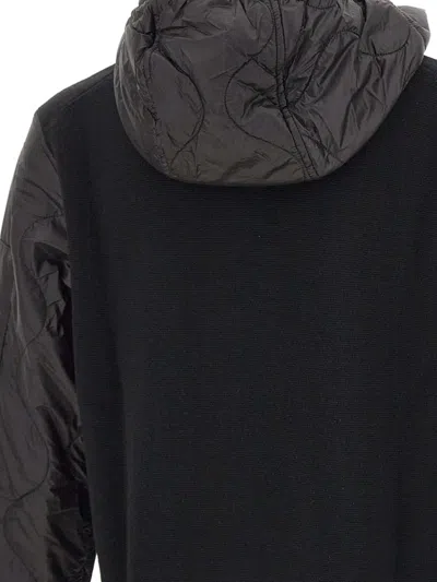 C.p. Company Men Black Jacket With Drawstring Hood And Logo Plaque On The Sleeve In Wool Man In Black