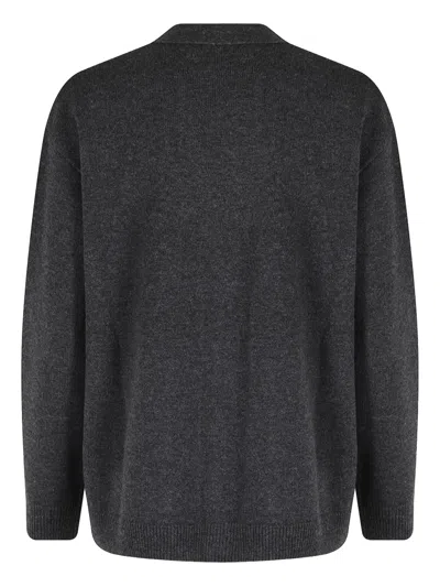 Seventy V-neck Long Sleeve Cardigan With Center Button Closure And Side Pockets In Black