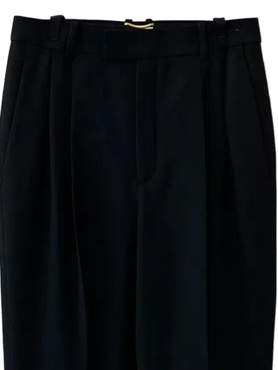 Saint Laurent Pleated-front Trousers In Black