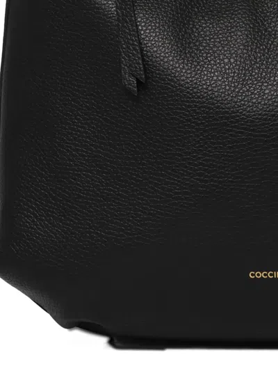 Coccinelle Malory Grained-leather Shoulder Bag In Black