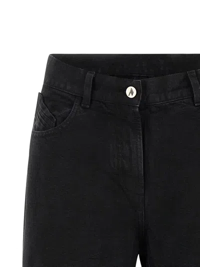 Attico Garment-dyed Cotton Denim Jeans In Black