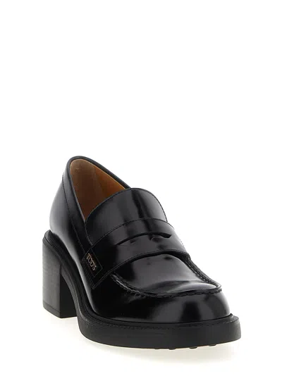 Tod's Black Loafers With Penny Slot And Logo Lettering On The Side In Black