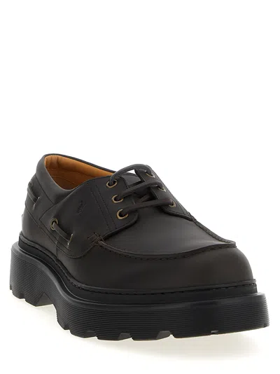 Tod's Leather Loafers Designed For Nautical Wear In Brown