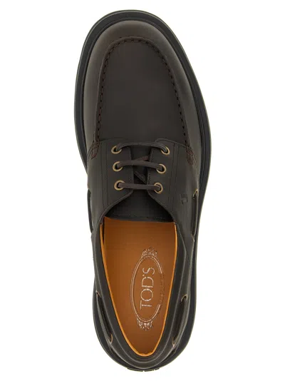 Tod's Leather Loafers Designed For Nautical Wear In Brown