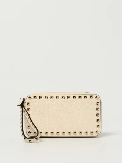 Valentino Rockstud Rectangular Clutch Bag With Wrist Strap In Yellow