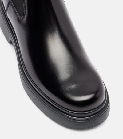 Tod's Chunky Sole Ankle Boots With Elastic Panels In Black