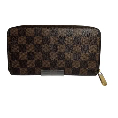 Pre-owned Louis Vuitton Ebene Long Wallet (bi-fold) () In Brown