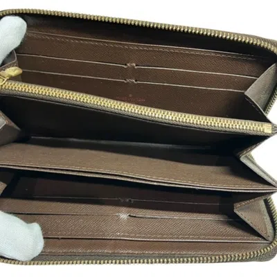 Pre-owned Louis Vuitton Ebene Long Wallet (bi-fold) () In Brown