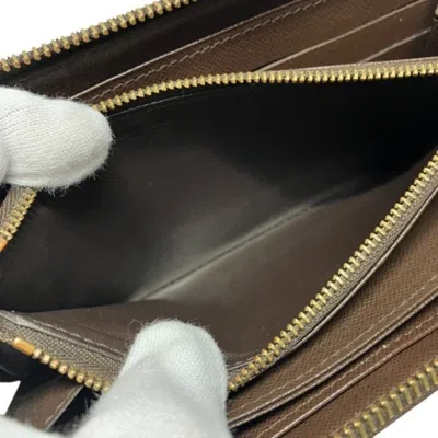 Pre-owned Louis Vuitton Ebene Long Wallet (bi-fold) () In Brown