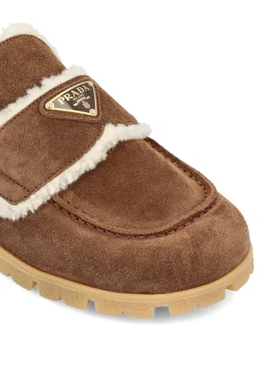 Prada Round Toe Suede Mules With Shearling Lining In Brown