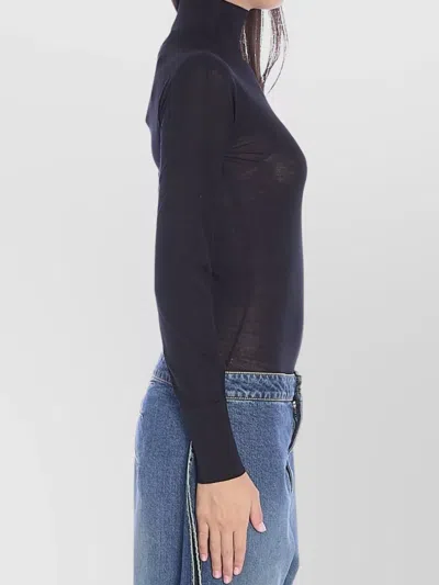 Alaïa Sheer Knit Turtleneck Bodysuit In Blue