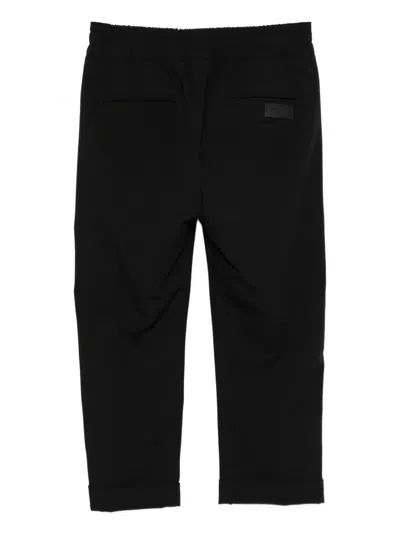 Msgm Elasticated-waistband Trousers In Black