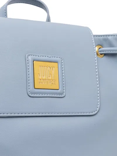 Juicy Couture Drawstring Flap Backpack In Blue