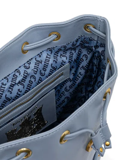 Juicy Couture Drawstring Flap Backpack In Blue
