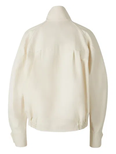 HIGH-NECK BUTTON-DETAIL JACKET