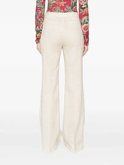 FLARED WOOL TROUSERS