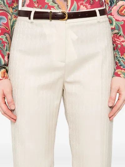 FLARED WOOL TROUSERS