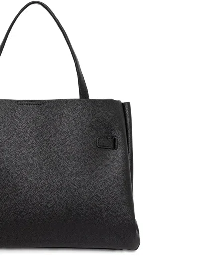 搭扣开合手提包