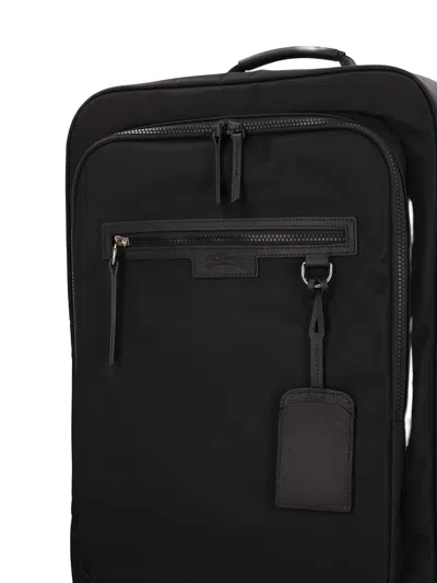 皮质边饰滚轮行李箱