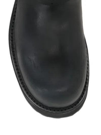 Balenciaga Venom Boots In Worn-out Effect Leather Shoes In Black